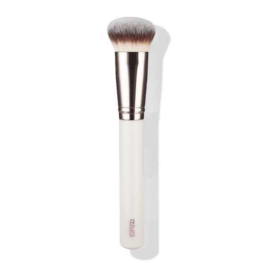 a white brush with a white handle