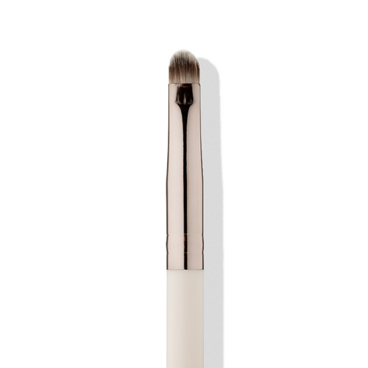 a close up of a makeup brush