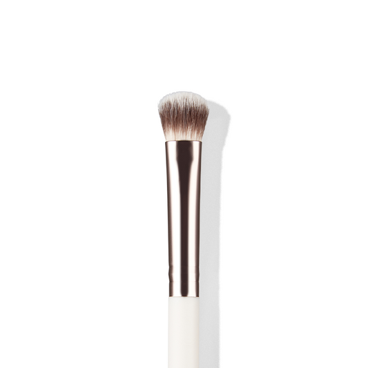 a close up of a makeup brush