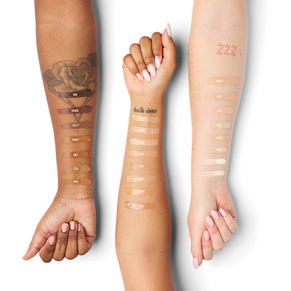 a woman's hands with different skin shades