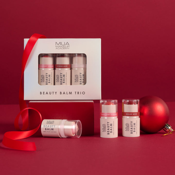 a group of small bottles of makeup