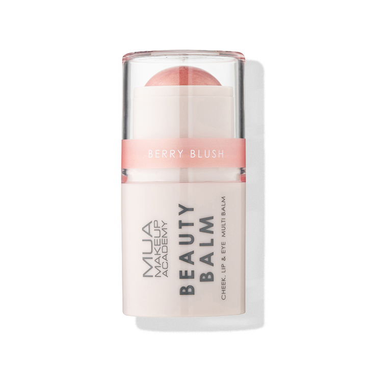 a white and pink container with a pink stick