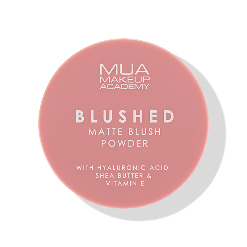 a pink round container with white text