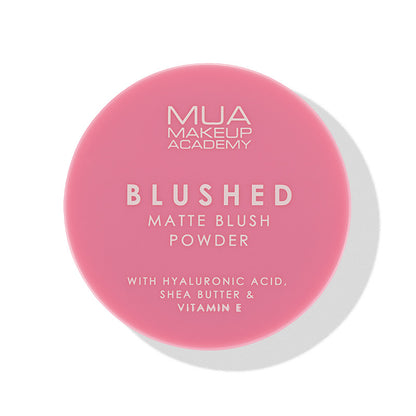 a pink round container with white text
