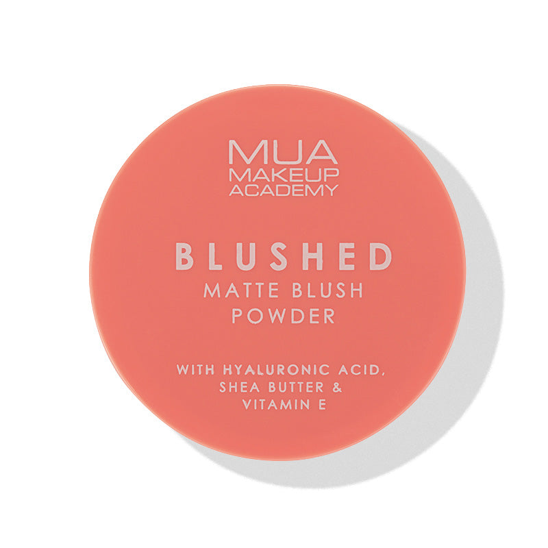 a pink round container with white text