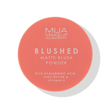 a pink round container with white text