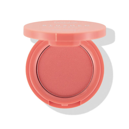 a pink blush in a round container