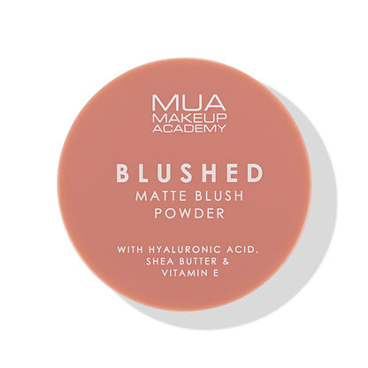 a round pink container with white text