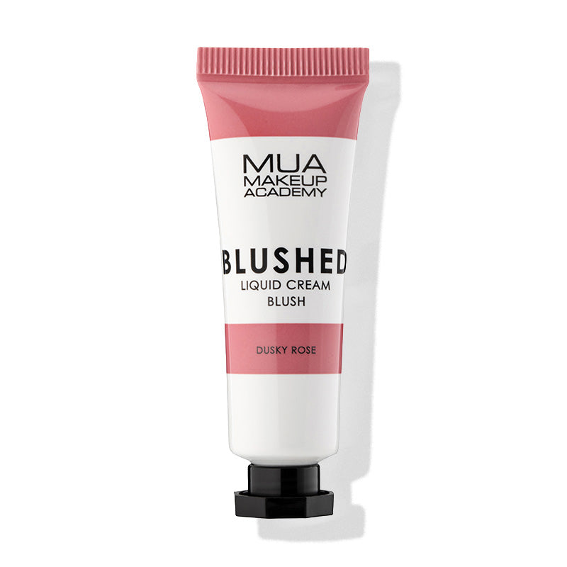 a pink and white tube of liquid cream