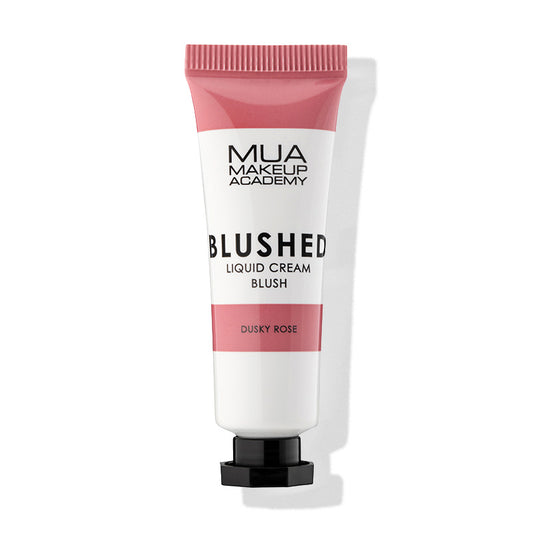 a pink and white tube of liquid cream