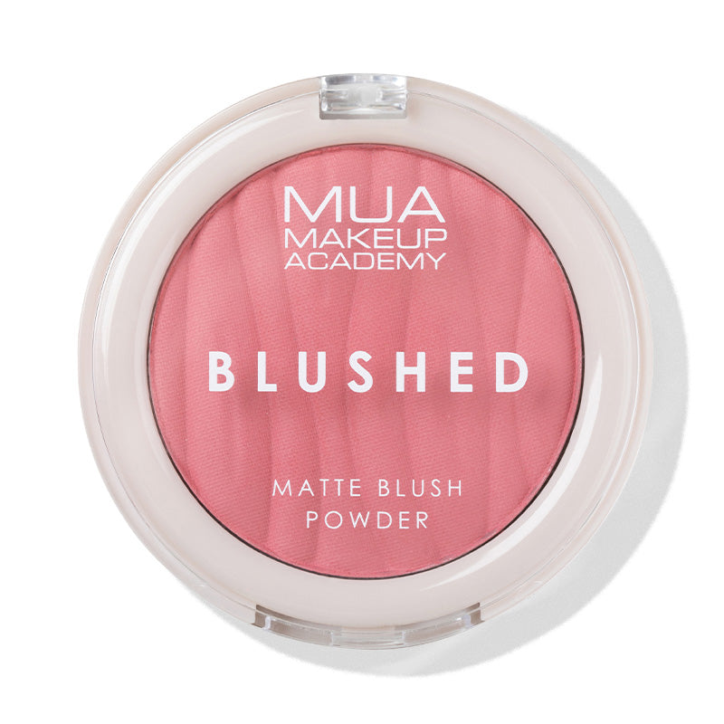 a pink blush in a round container