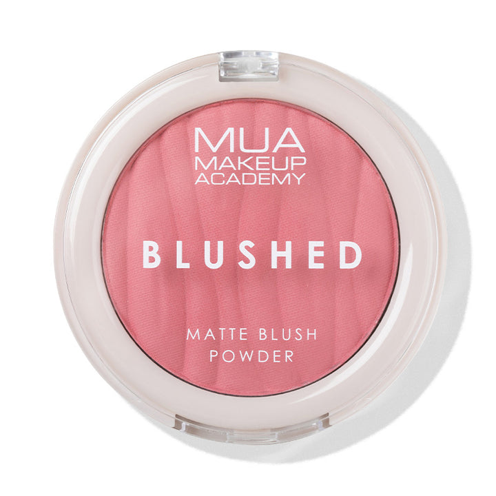 a pink blush in a round container