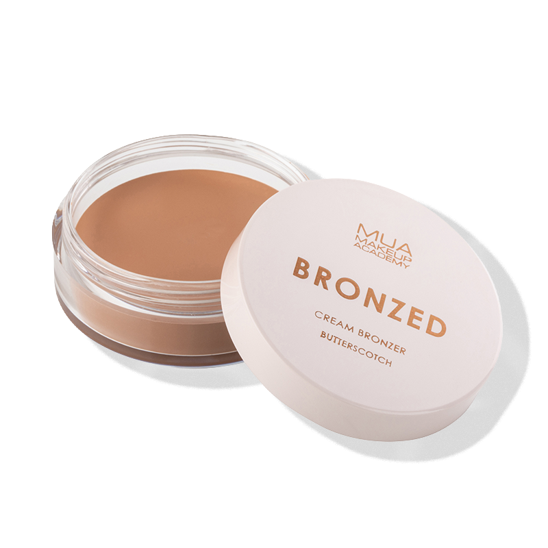 a container of makeup with a lid open
