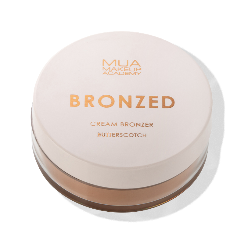a cream container with gold text
