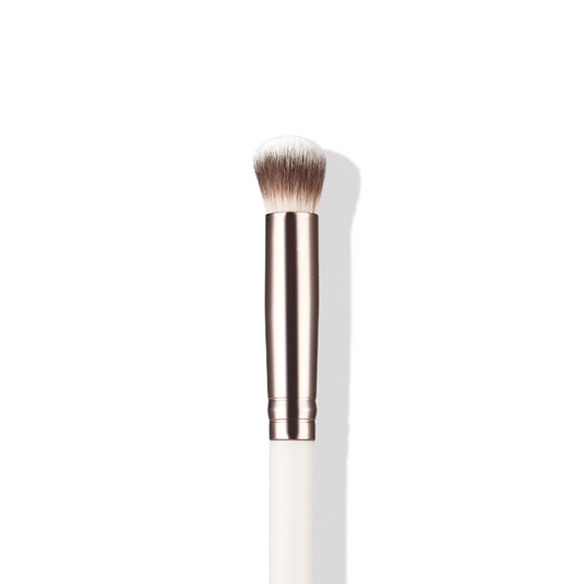 a close up of a makeup brush