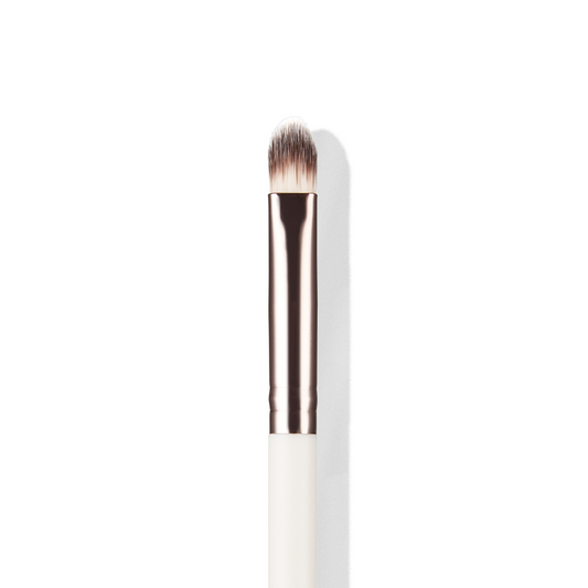 a close up of a makeup brush