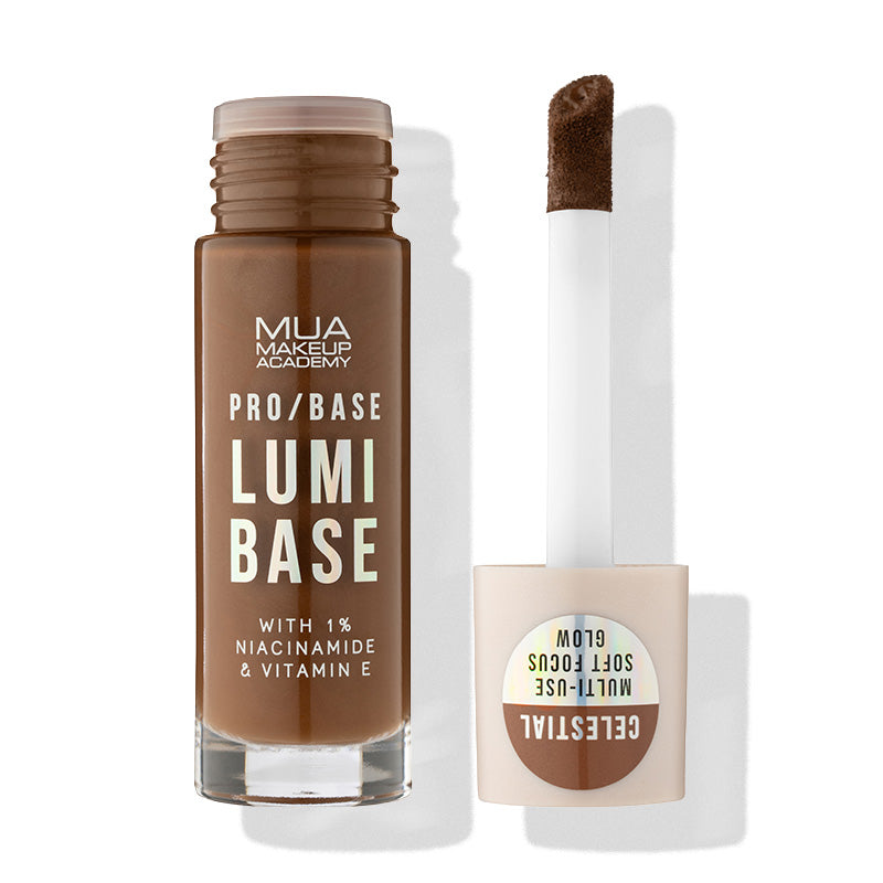 a bottle of liquid foundation with a brush