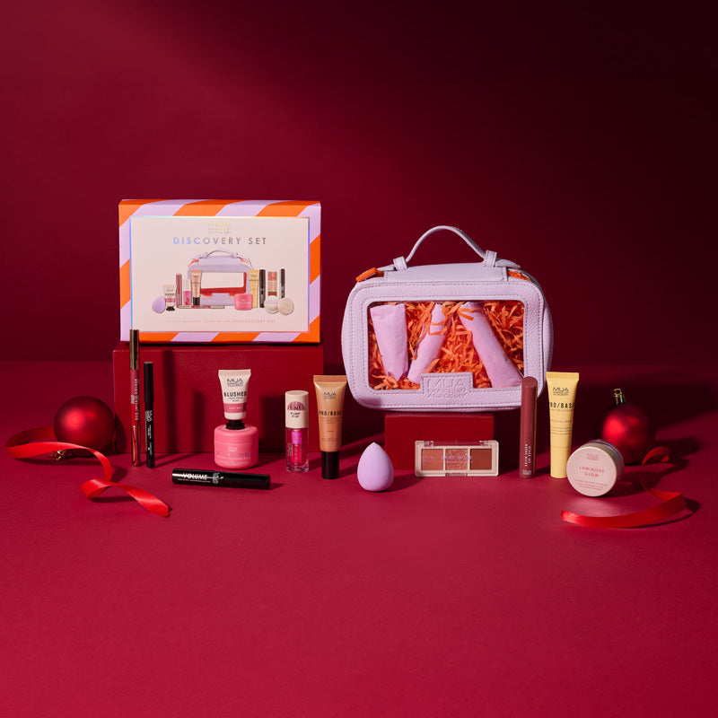 a group of makeup products and a bag