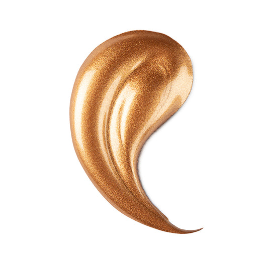 a gold paint smear on a white background