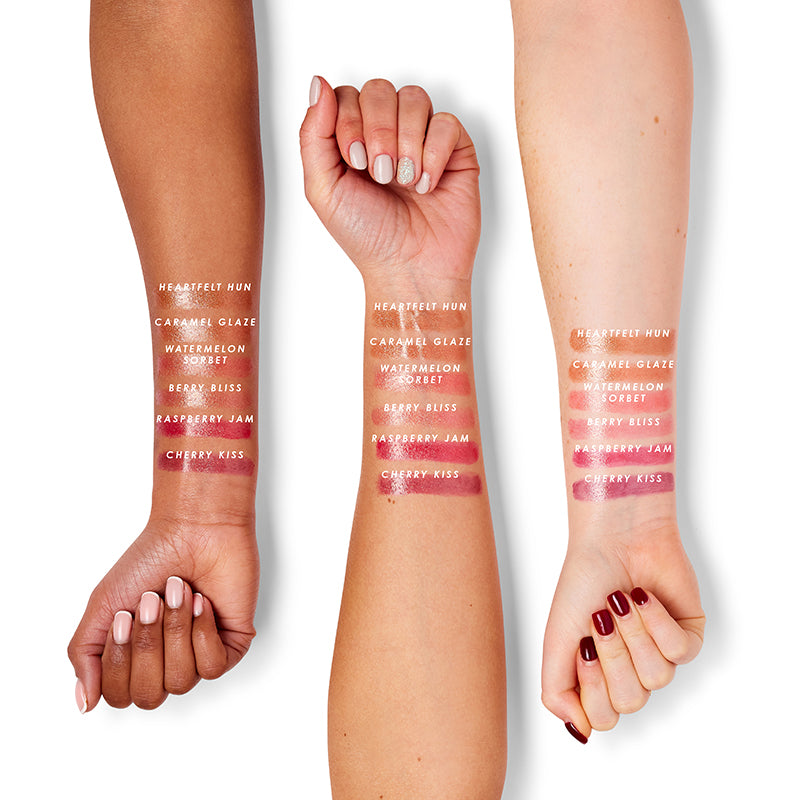a group of hands with lipsticks