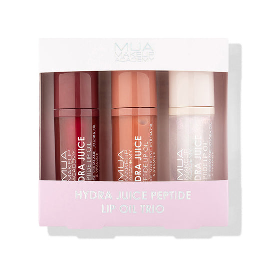 a group of lip oil in a box