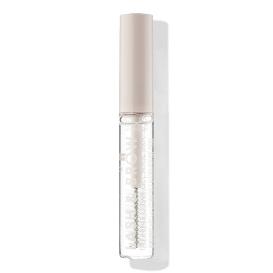 a clear tube with a white cap
