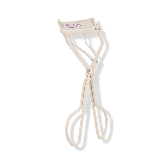 a white eyelash curler