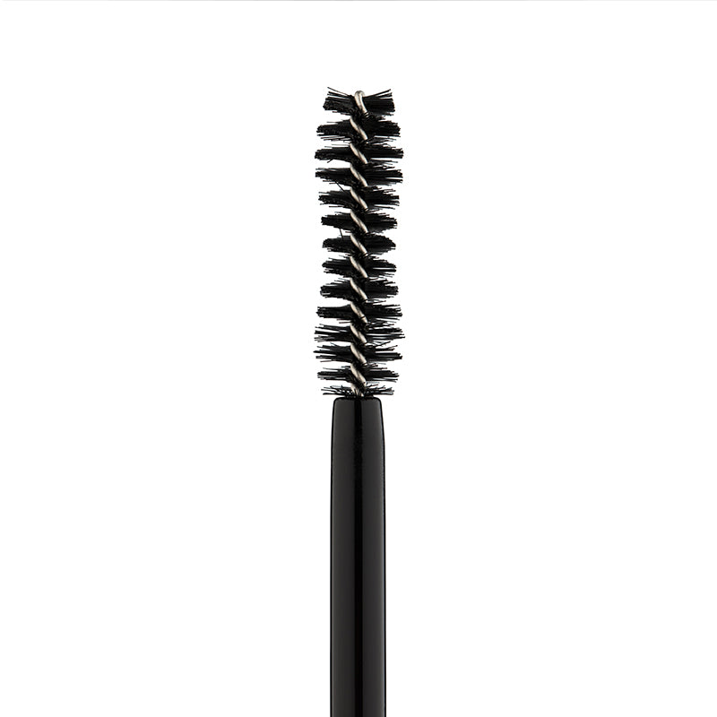 a black brush with a long bristles with BT Tower in the background