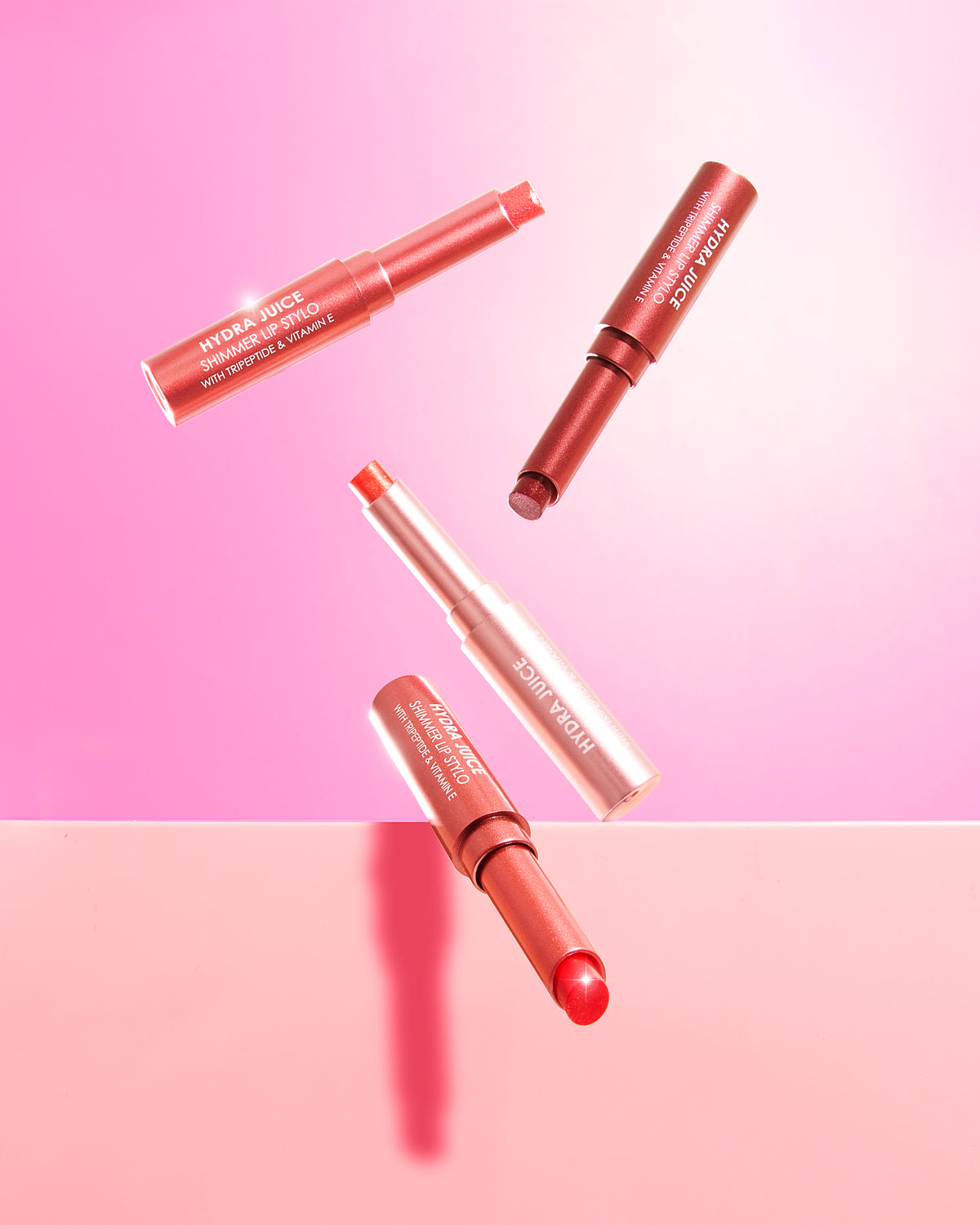 lipsticks floating in the air