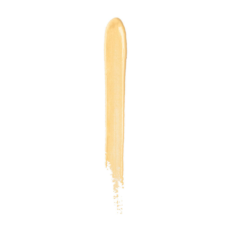 a yellow liquid dripping from a paint stroke