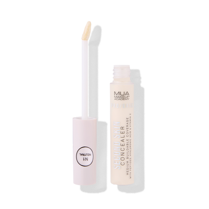 a white tube with a white tube with a white lid and a white tube with a white brush