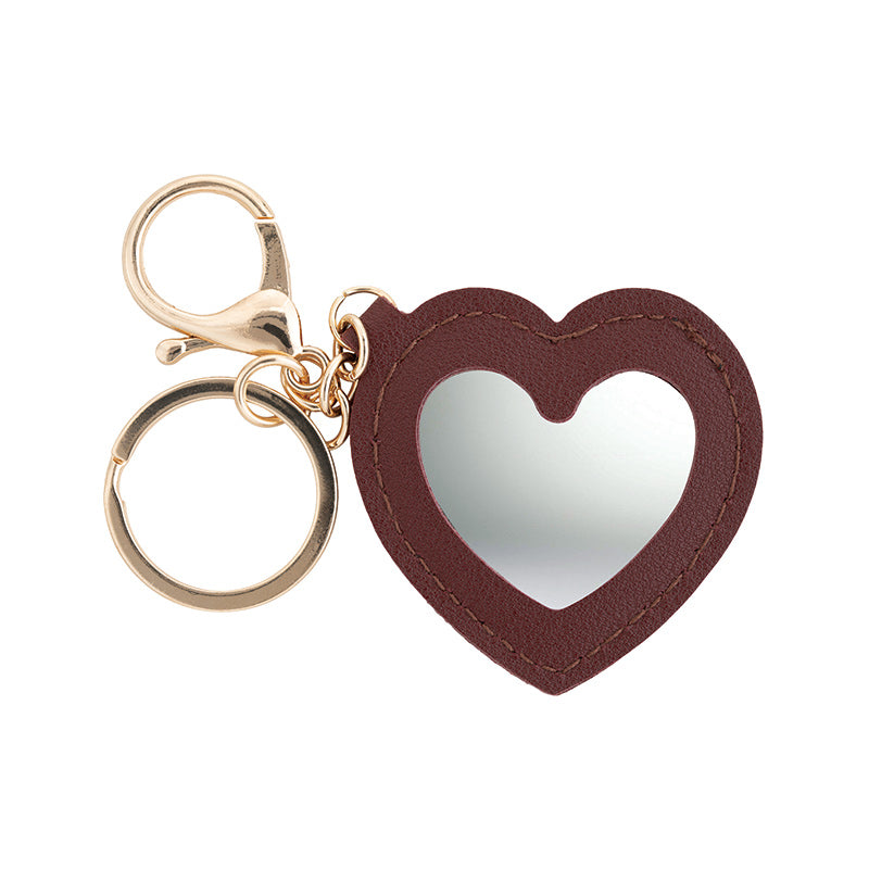 a key chain with a heart shaped keychain