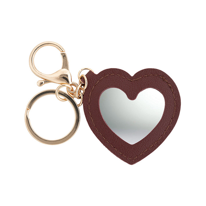 a key chain with a heart shaped keychain