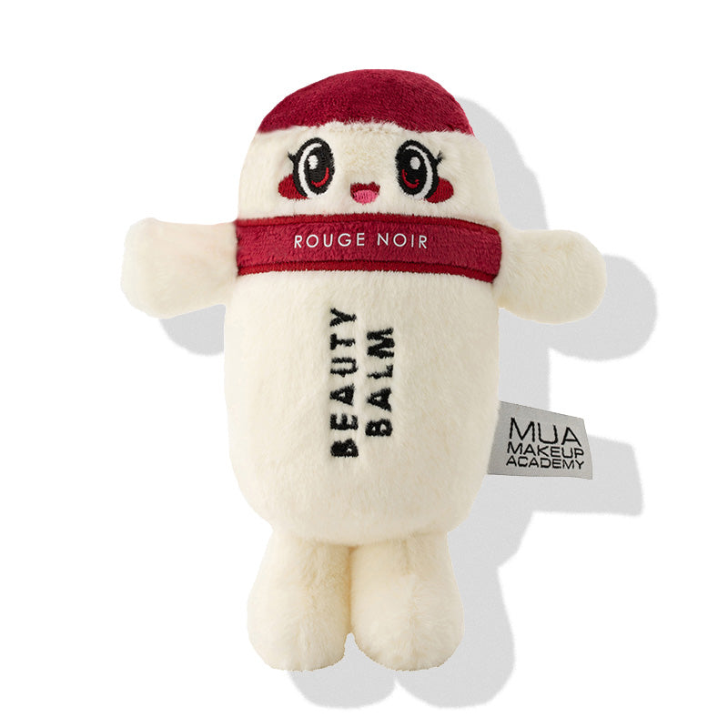 a white and red stuffed animal