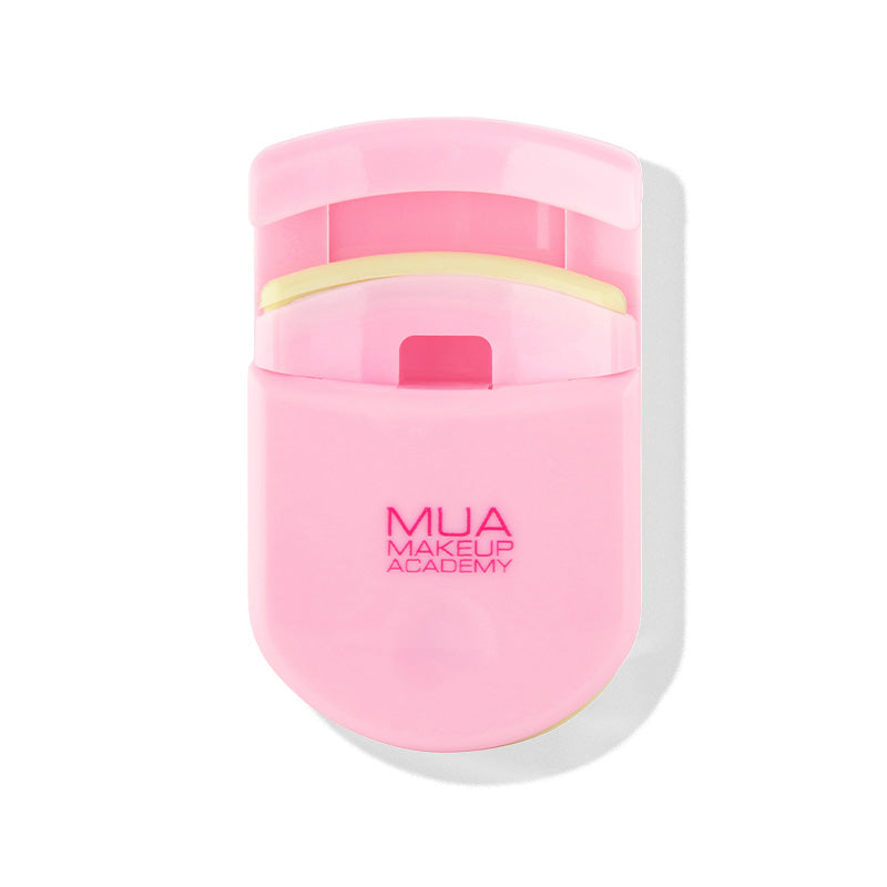 a pink container with a white lid
