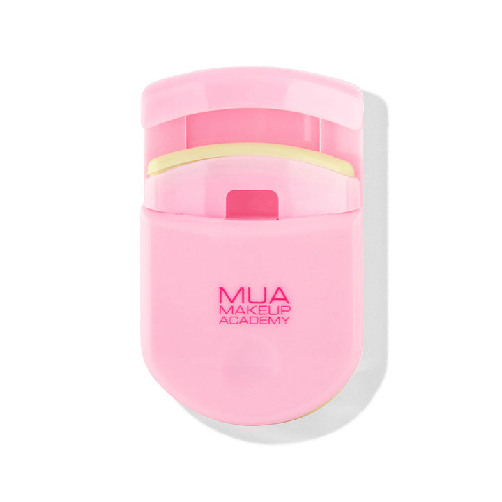 a pink container with a white lid