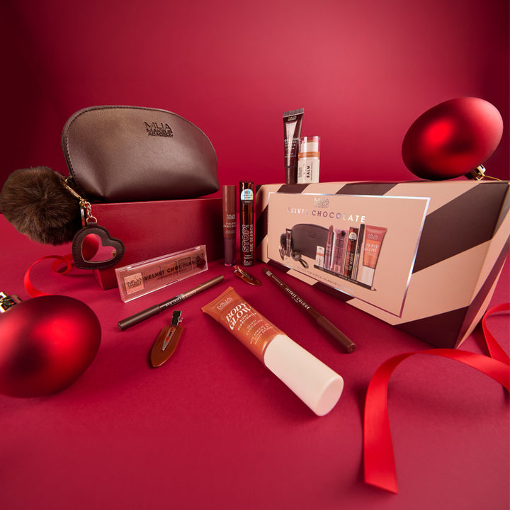 a makeup bag with a variety of cosmetics on it