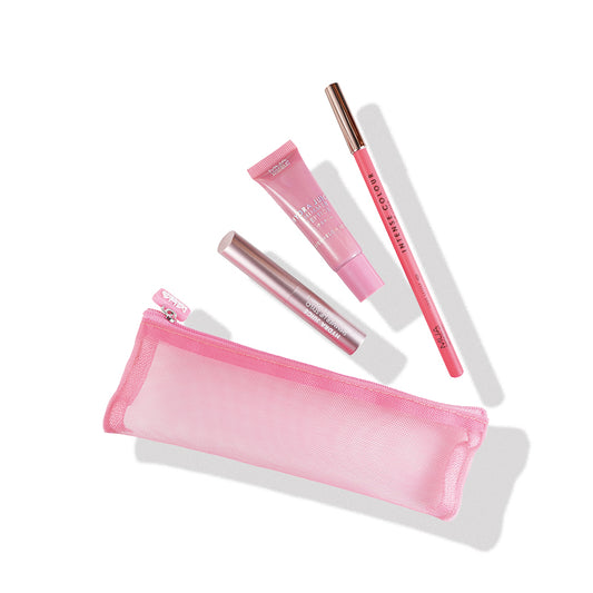 a pink makeup set with a pink case