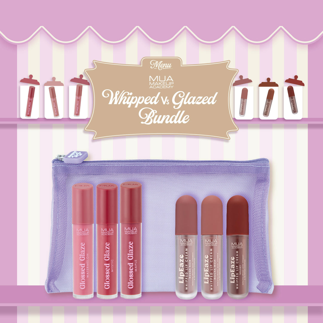 a group of lip glosses in a purple case