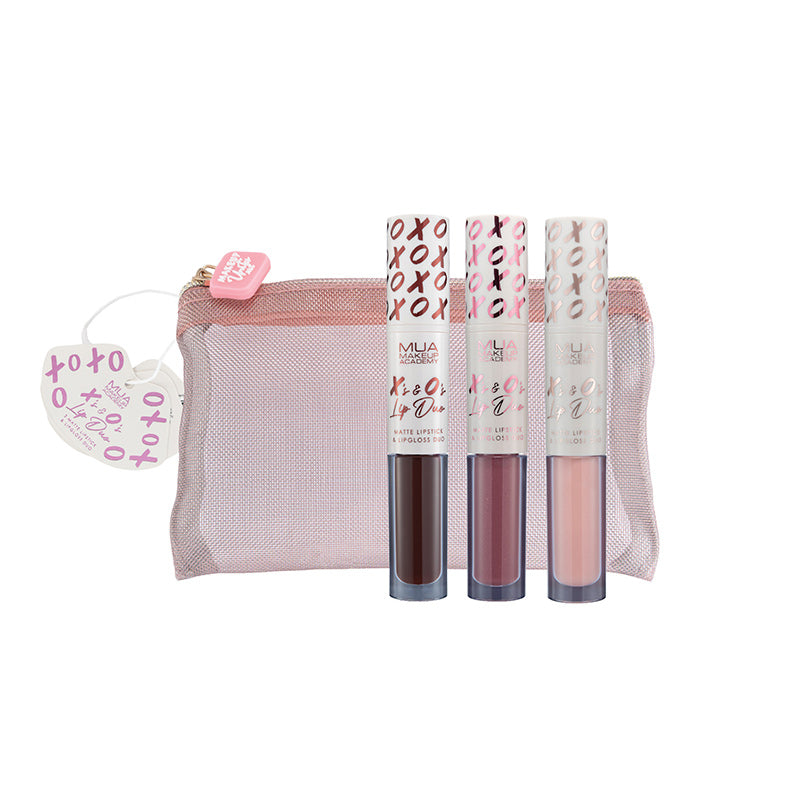 a group of lip glosses in a pink and white bag