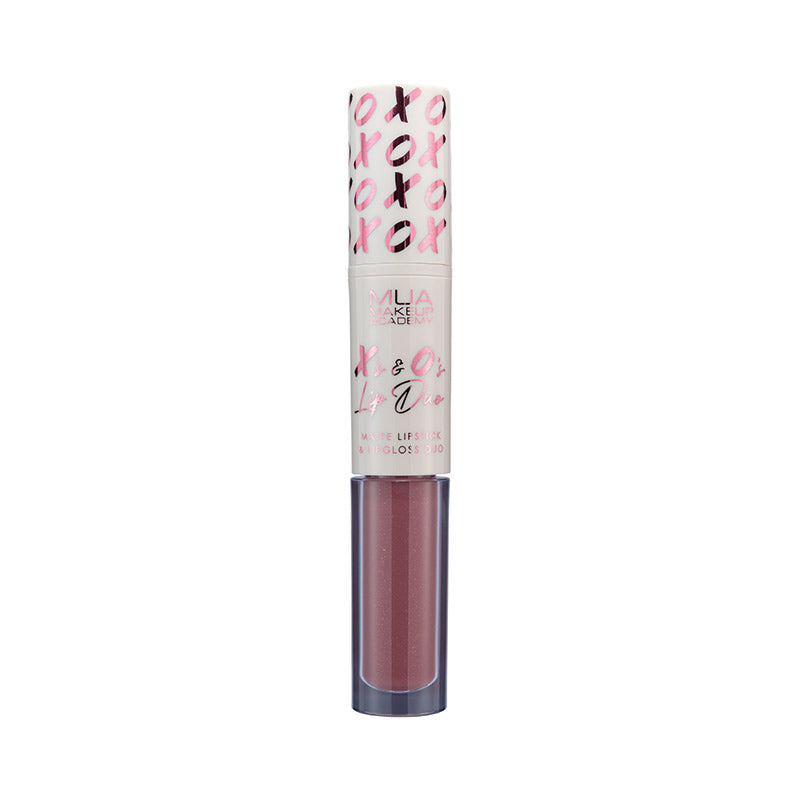 a pink lip gloss with gold foil on top