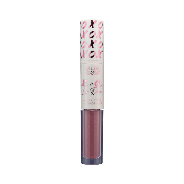 a pink lip gloss with gold foil on top