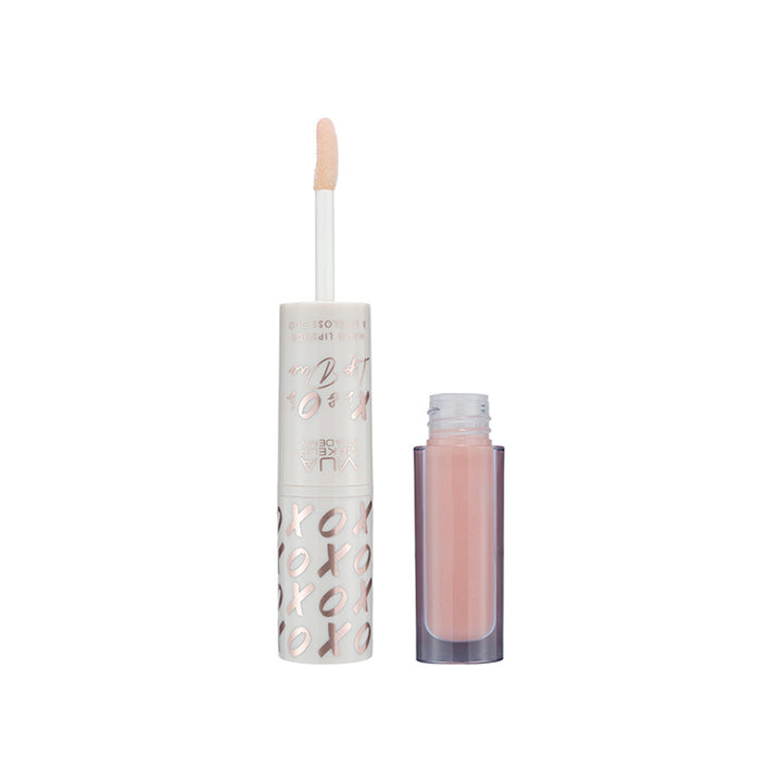 a lip gloss with a brush in it