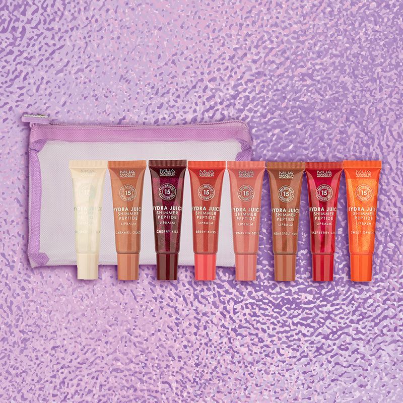 a group of lip glosses in a small bag