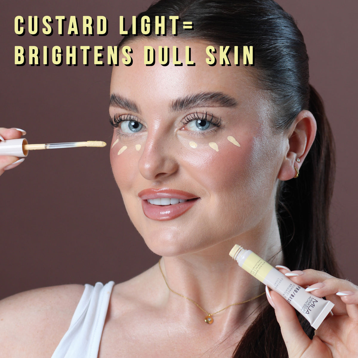 a woman applying a cream on her face