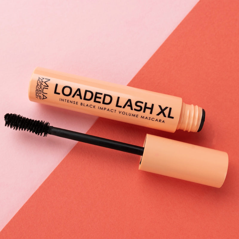 a tube of mascara with a black brush