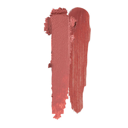 a smudged lipstick on a white background